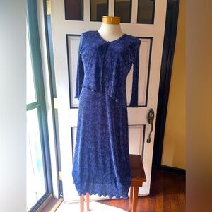 Vintage Studio Connection. Dress size 14. Blue dress with while polka dots.